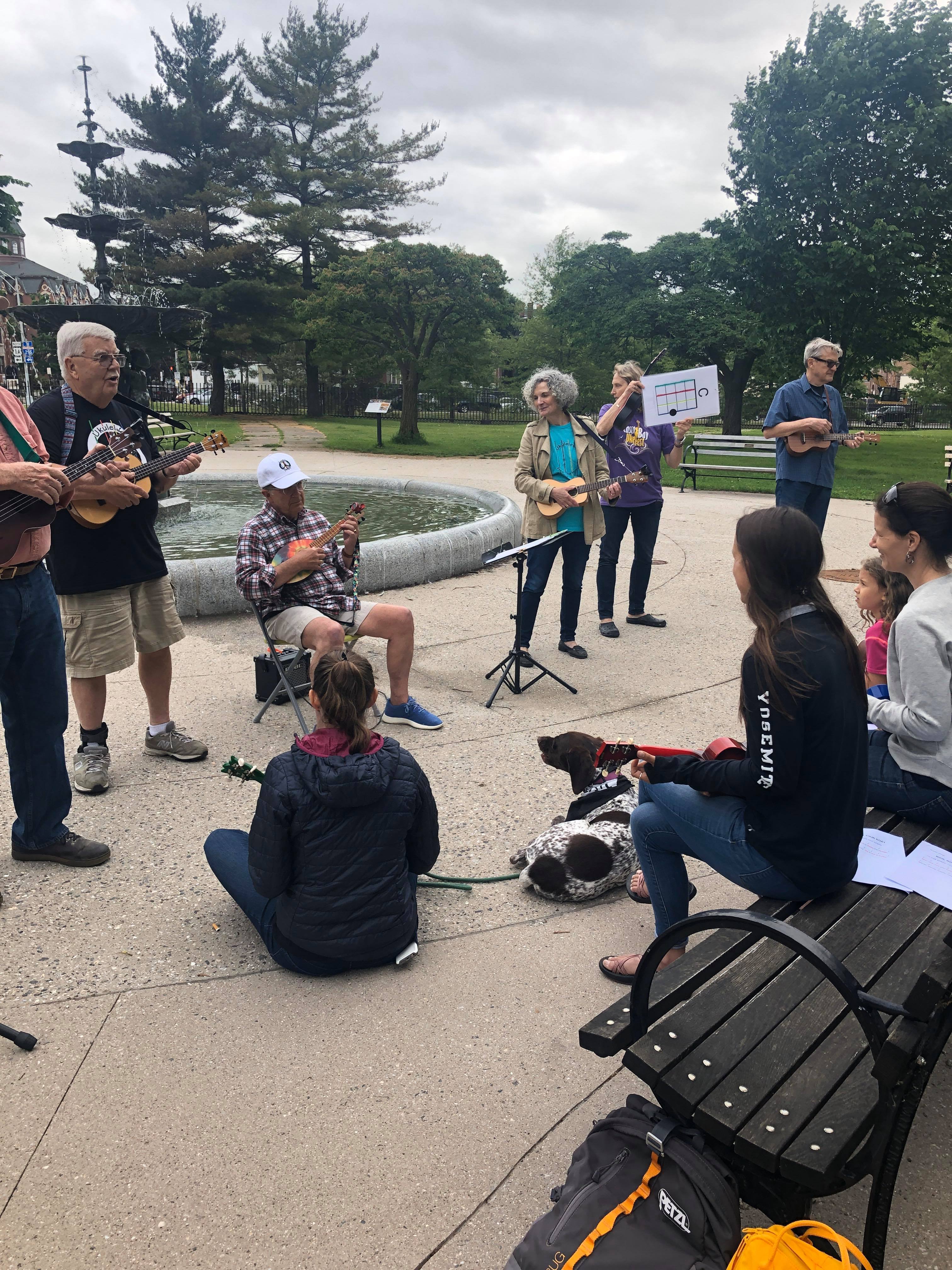 folks listen to a band playing at make music portland